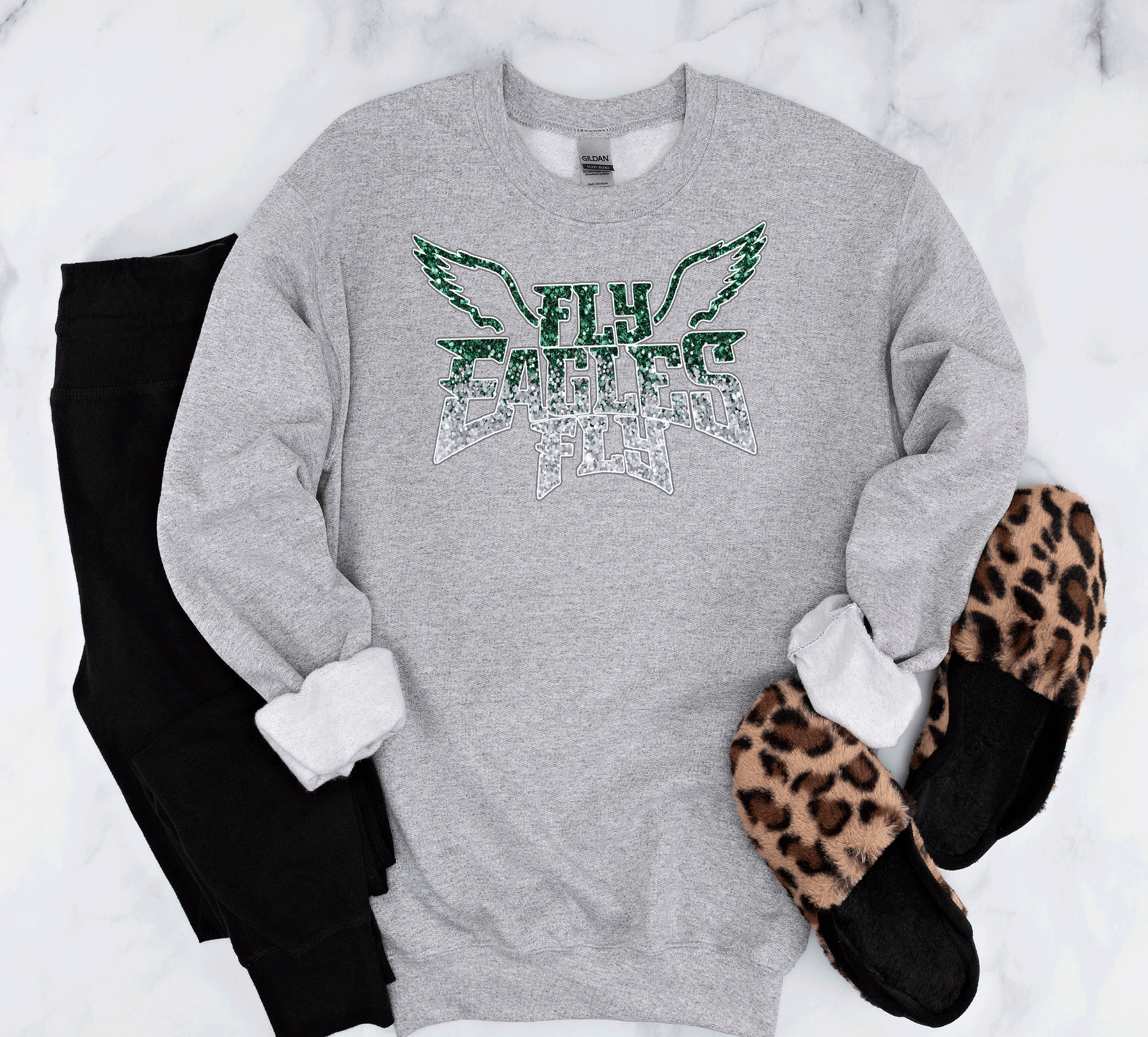 A Blessed Texas Mess Boutique EAGLES Fly Birds Fly Faux Glitter Bling Philadelphia Football Sweatshirt,… — A Blessed Texas Mess Boutique branding close-up
