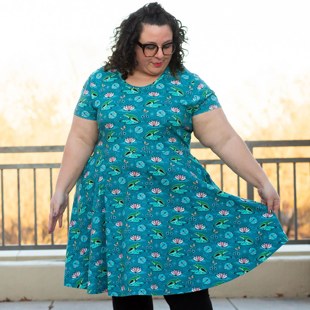 Princess Awesome & Boy Wonder Adult Frogs Super Twirler Dress with Pockets — Princess Awesome & Boy Wonder branding close-up