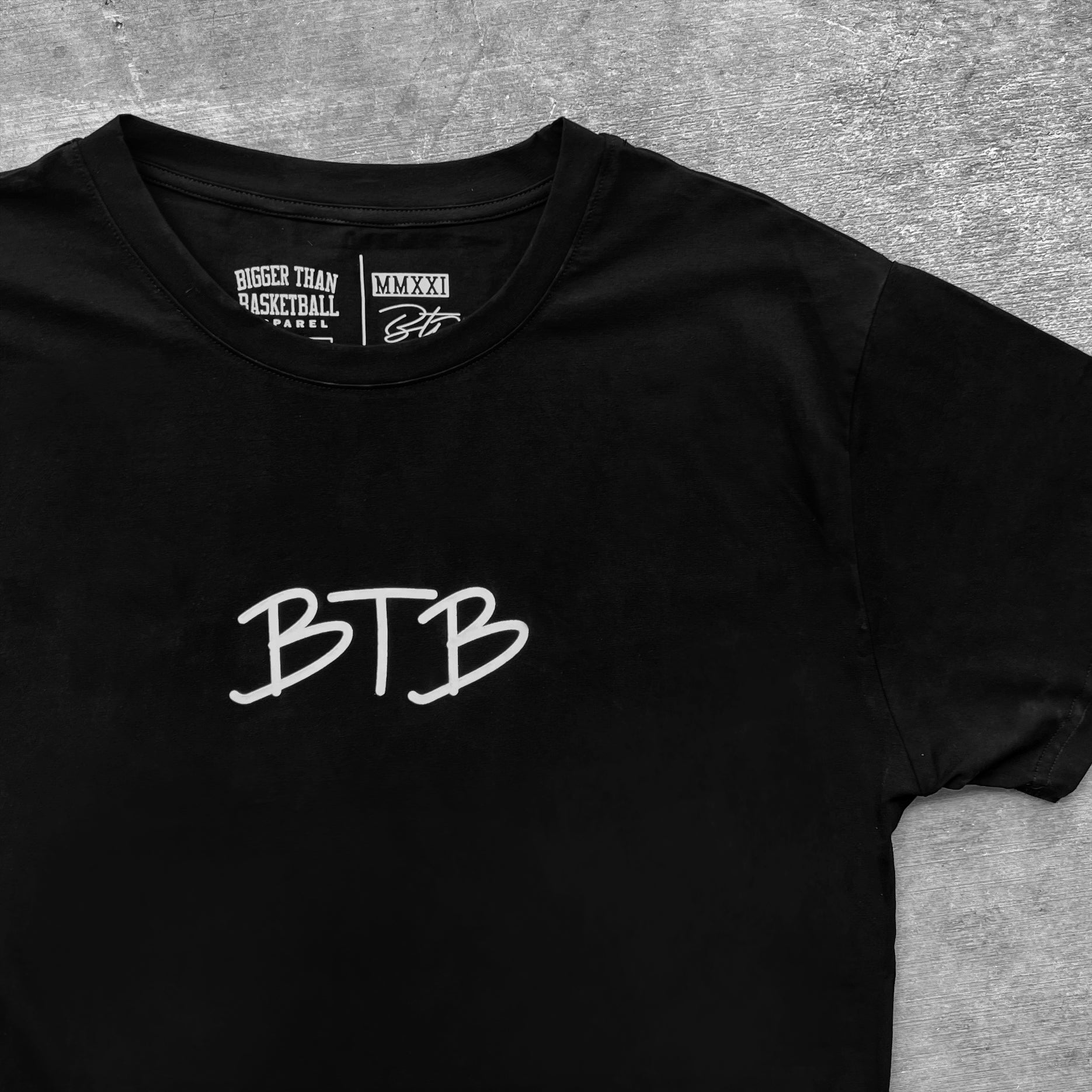 Bigger Than Basketball Too Busy Getting Buckets - T-Shirt - Black — Bigger Than Basketball branding close-up
