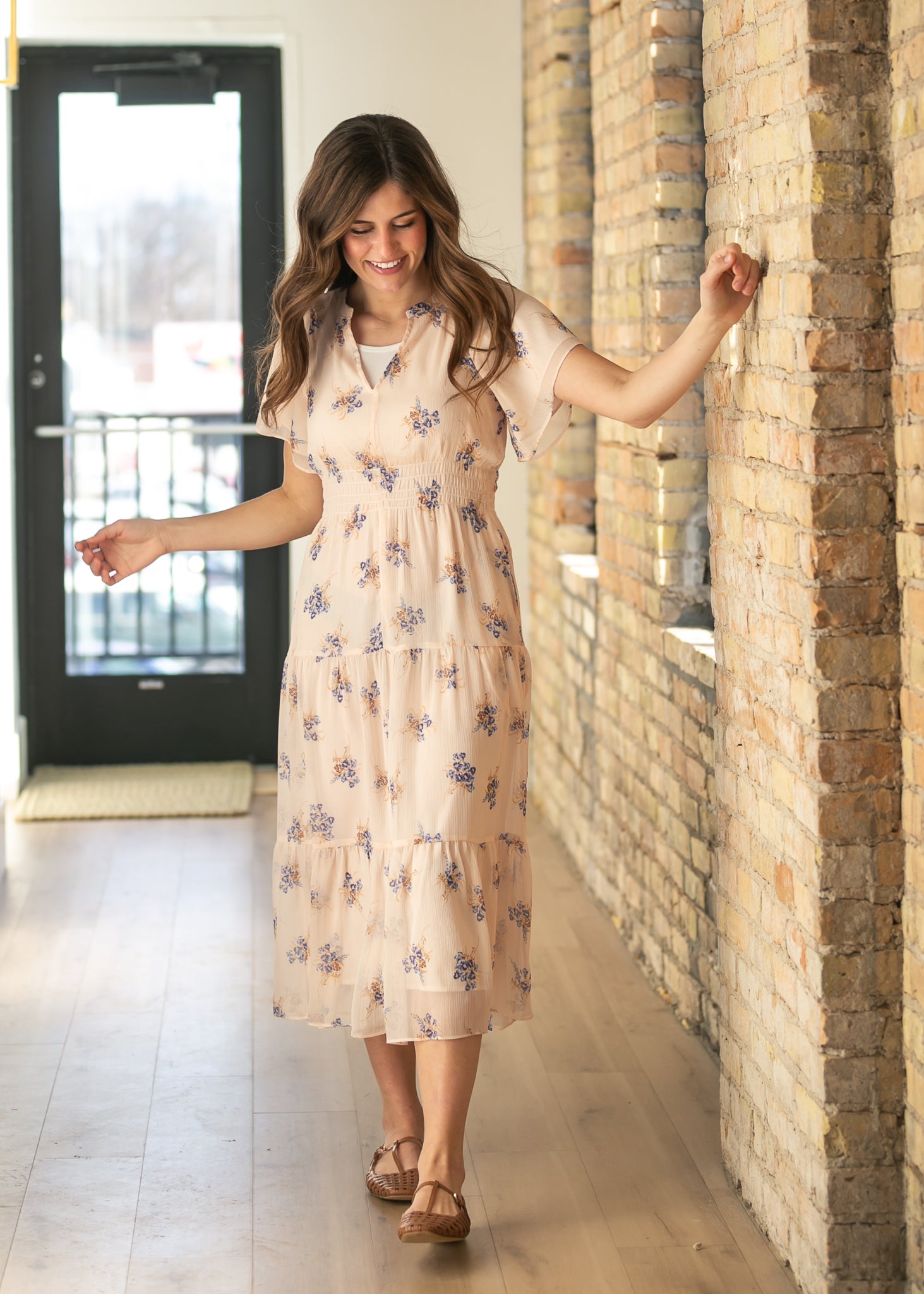 Inherit Co. Gina Pink Floral Short Sleeve Tiered Midi Dress — lifestyle context