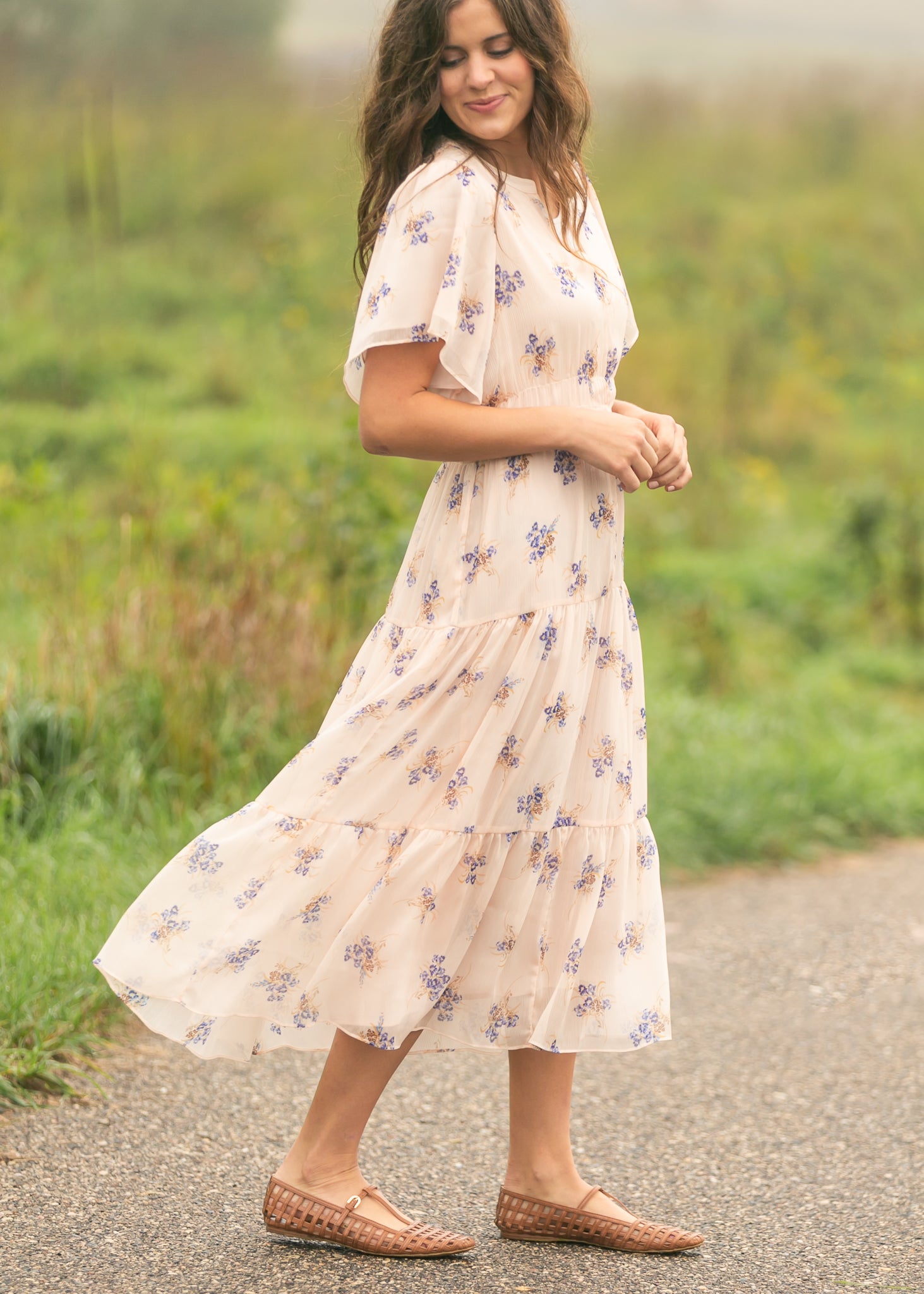 Inherit Co. Gina Pink Floral Short Sleeve Tiered Midi Dress — lifestyle context