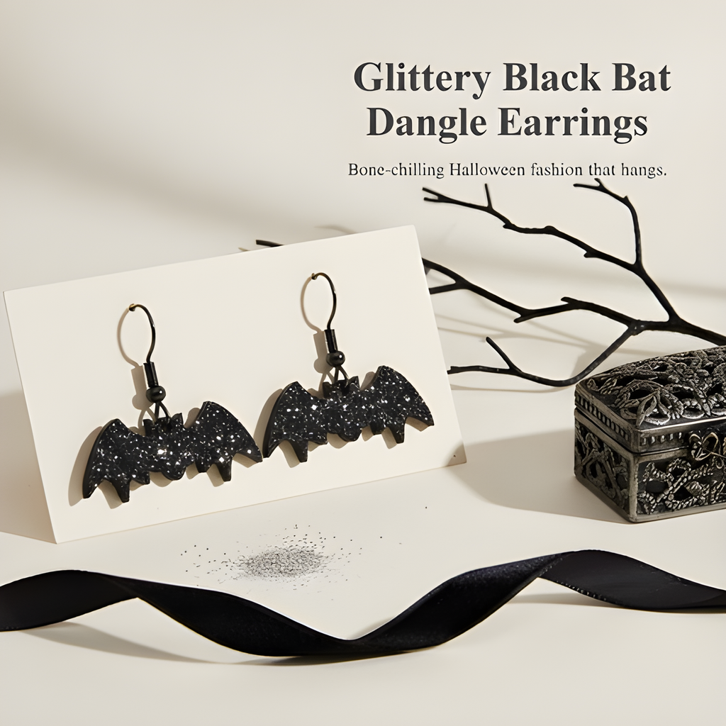 BodyCandy Glittery Black Bat Dangle Earrings — detail close-up