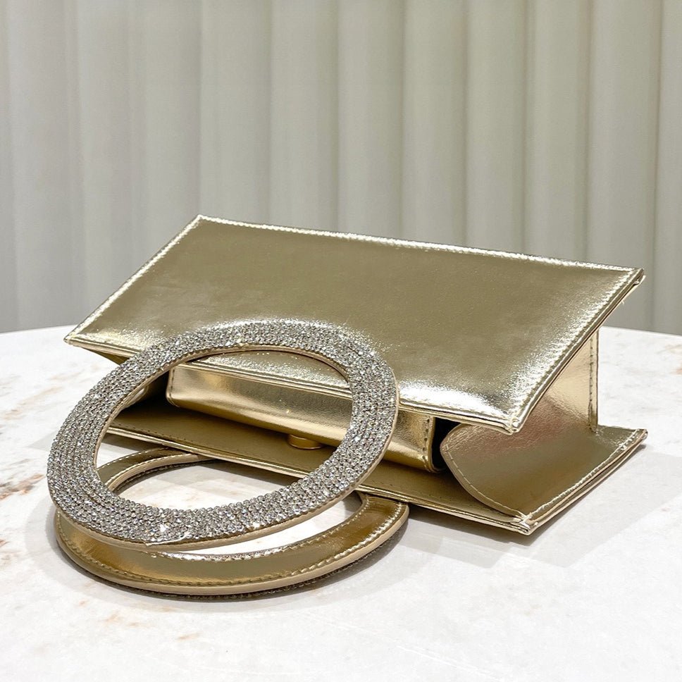 Mariam's Collection Gold Reflective Evening Clutch with Diamond-Studded Circular Handle (MAC294) — lifestyle worn / used context