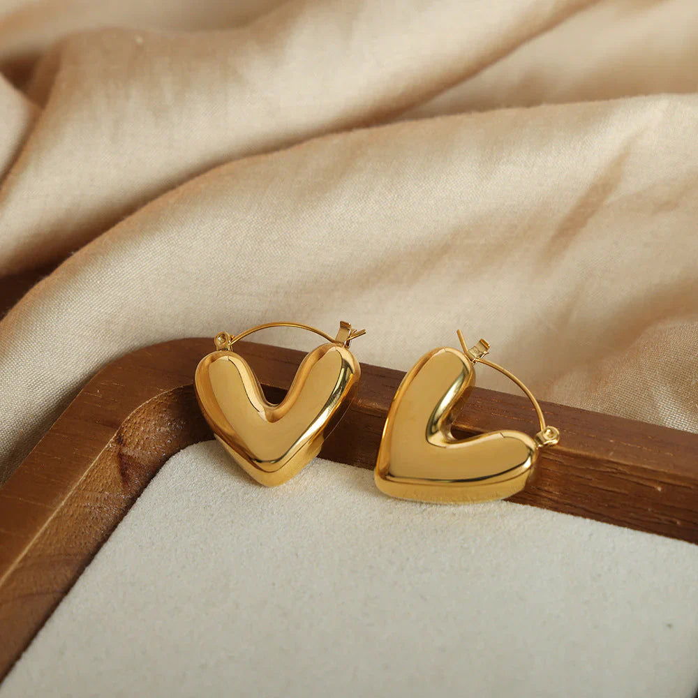 SORI STYLE Golden Puff Heart Hoop Earrings — lifestyle context