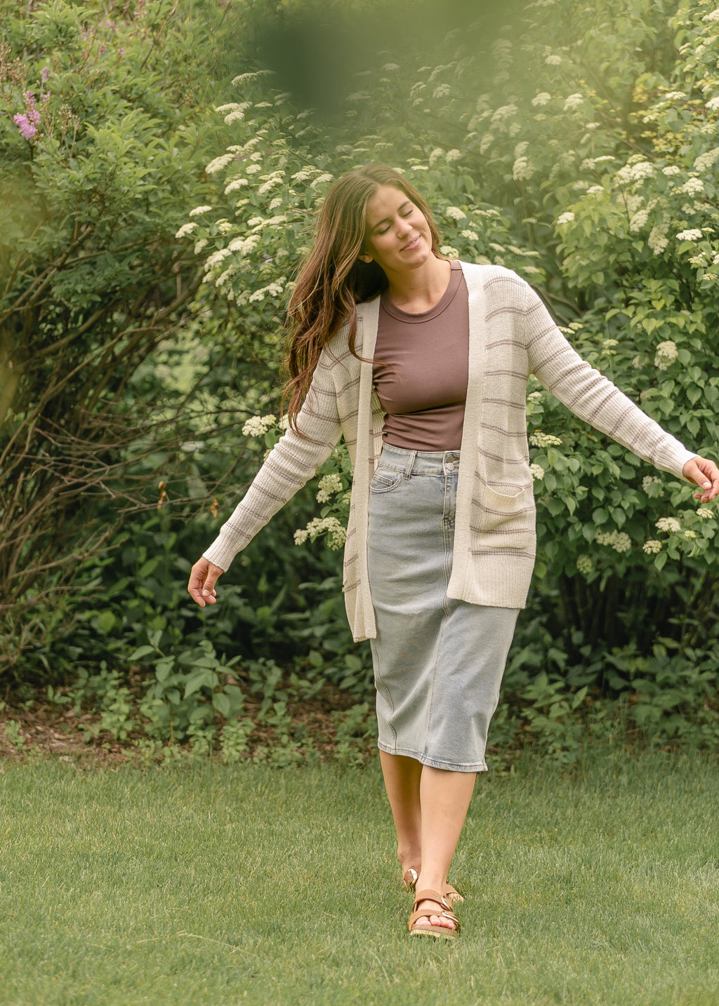 Inherit Co. Greta Light Wash Midi Denim Skirt — product on model