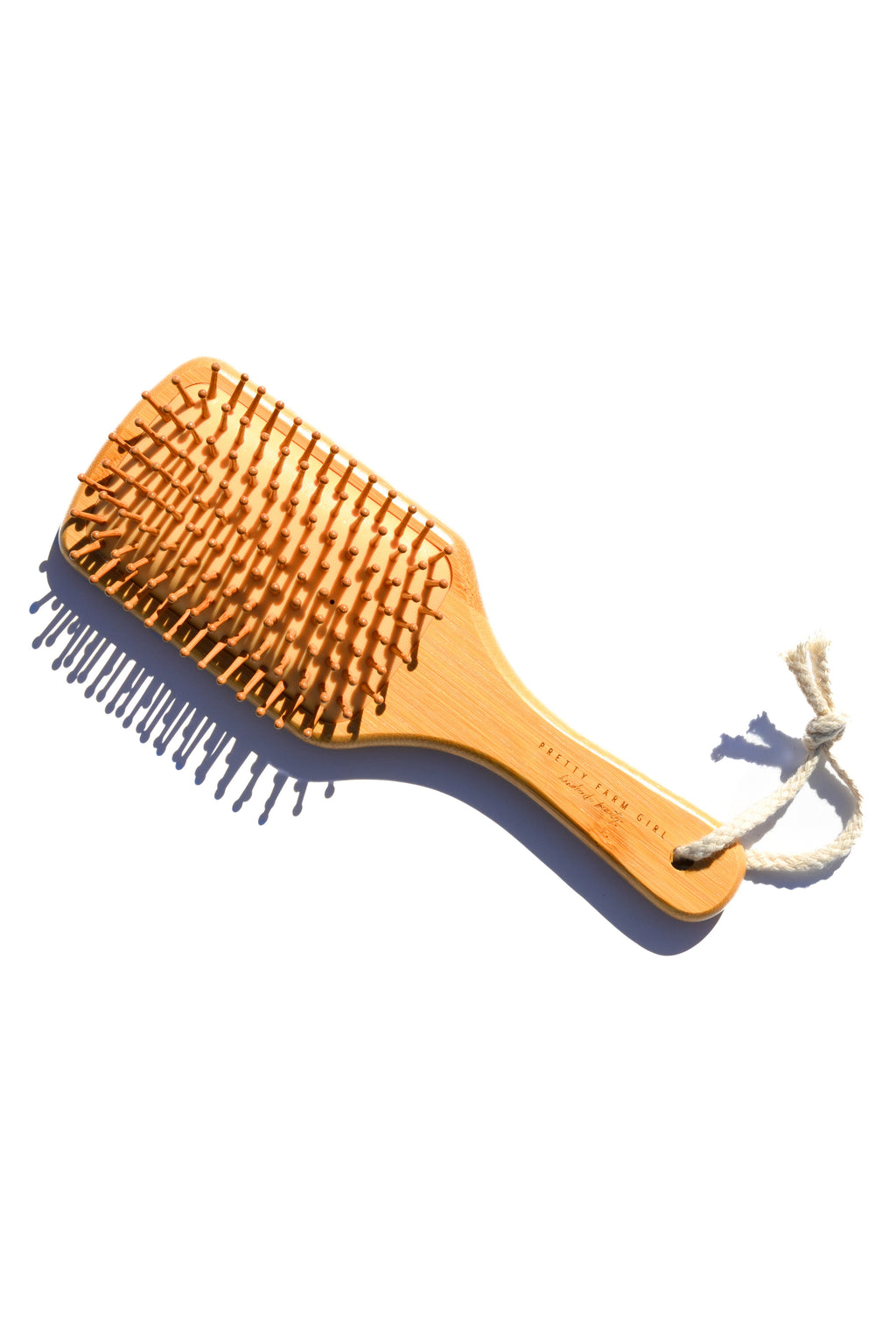 Pretty farm girl Bamboo Paddle Hair Brush — lifestyle context
