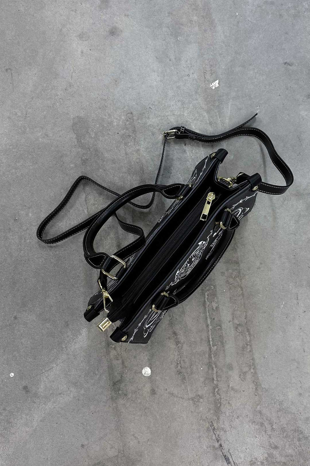 Thrash Happy Tattoo Shorty Handbag — lifestyle context