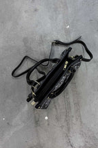 Thrash Happy Tattoo Shorty Handbag — lifestyle context