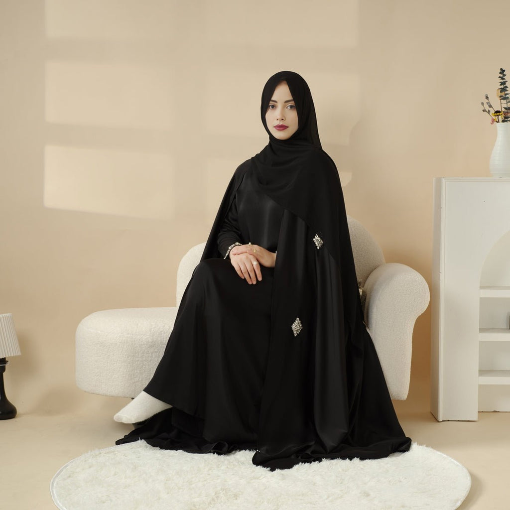 Mariam's Collection Cape Abaya, Haute Couture Heavy Rhinestone Abaya (MOA067) — Mariam's Collection branding close-up