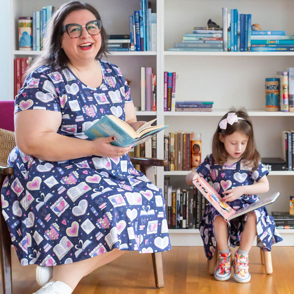 Princess Awesome & Boy Wonder Adult "Love Letters" Books Super Twirler Dress with Pockets — Princess Awesome & Boy Wonder branding close-up