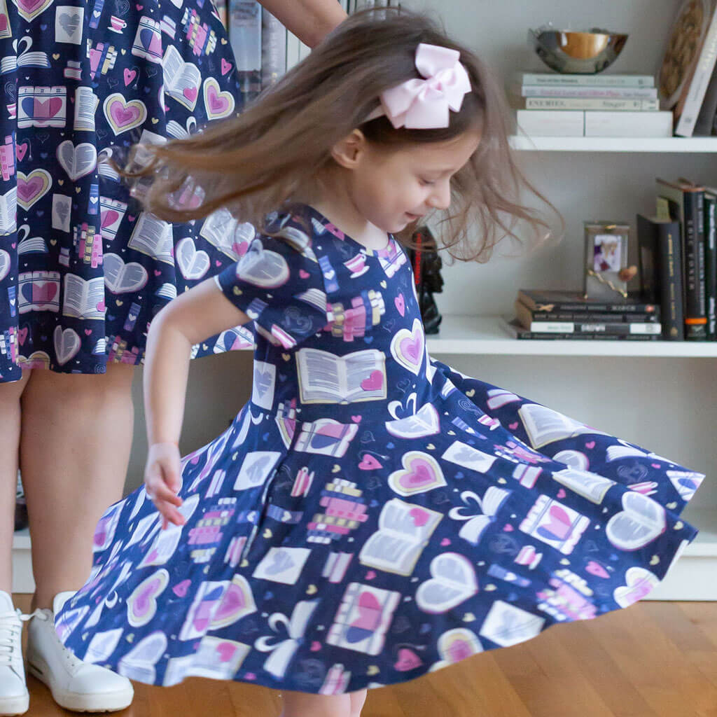Princess Awesome & Boy Wonder "Love Letters" Books Super Twirler Dress with Pockets — lifestyle worn / used context