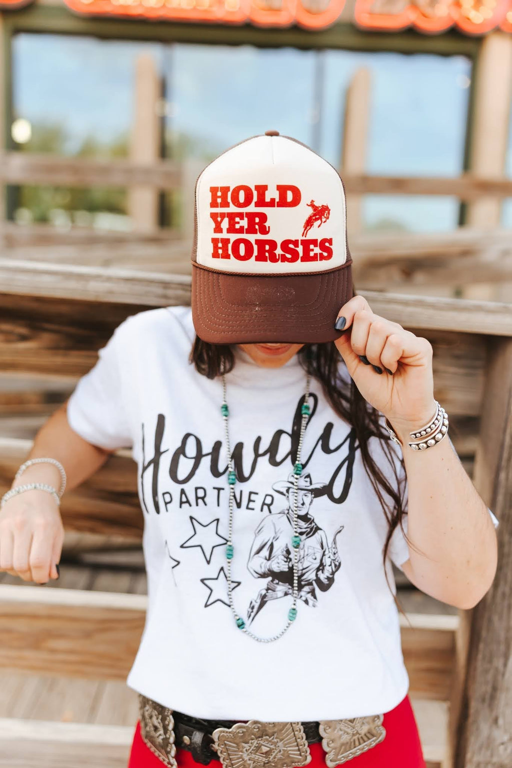 Wild Junkie Hold Yer Horses Trucker Hat — lifestyle worn / used context