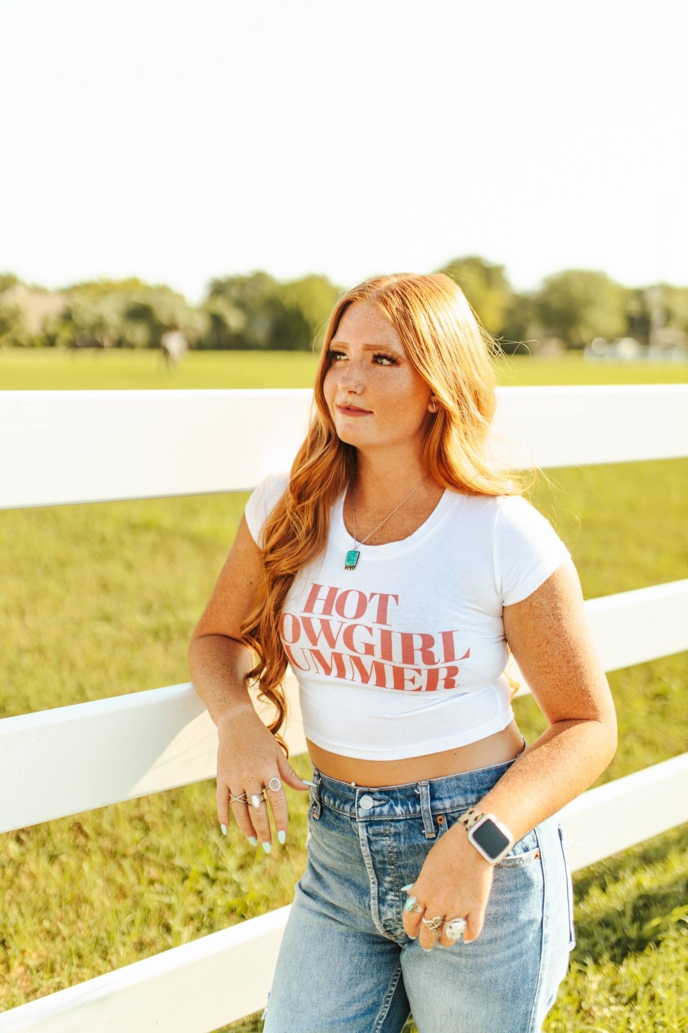 Wild Junkie Hot Cowgirl Summer Babydoll Graphic Tee — Wild Junkie branding close-up