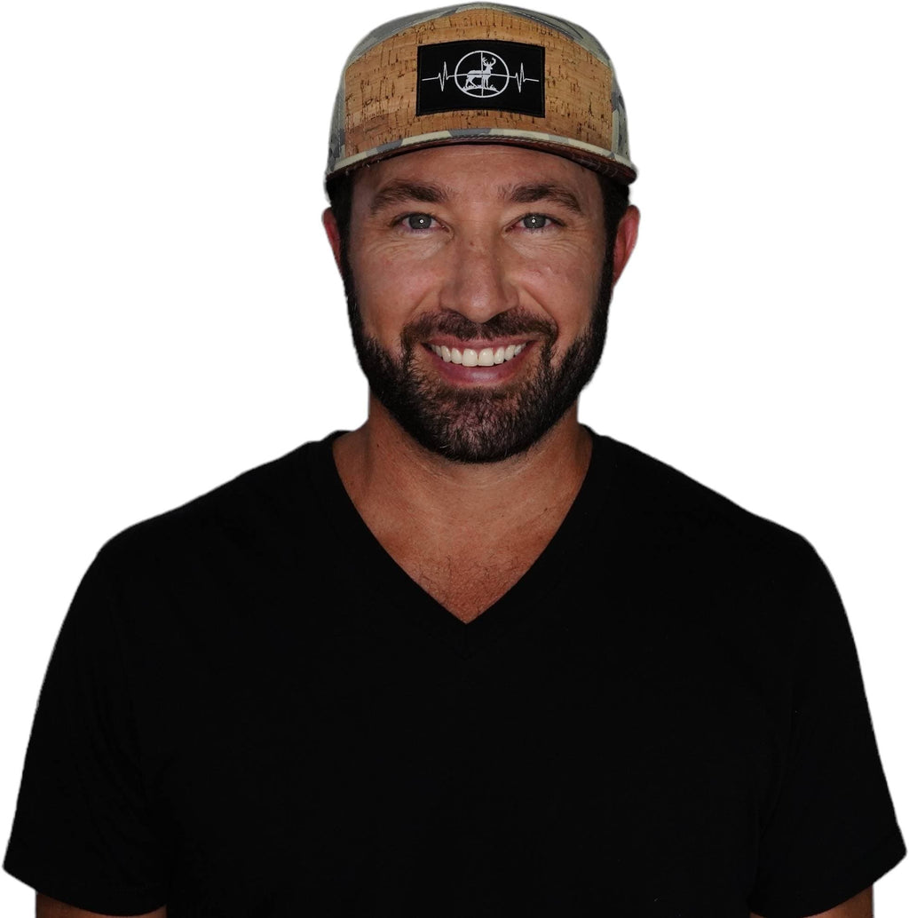The Heartbeat Brand Hunting Hat - Flat Bill - Cork - Soft Sand Camo - Laser Mesh — detail close-up