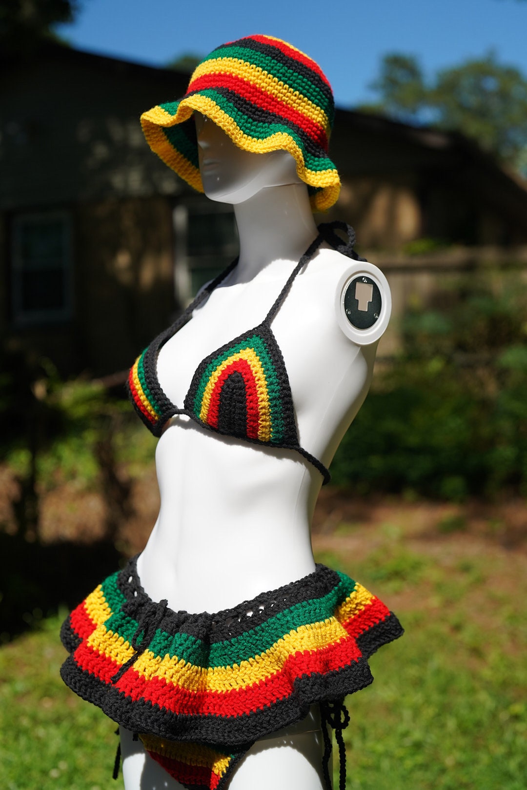 Stitched by Spice Handmade Jamaica Rasta Crochet Bikini 4-Piece Set with Micro Mini Skirt and Bucket Hat — in-use photo