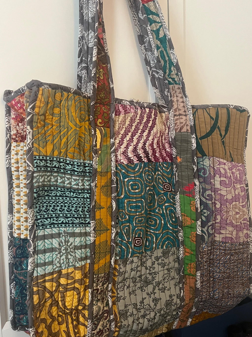 Darn Good Yarn Quilted Cotton Tote — lifestyle worn / used context