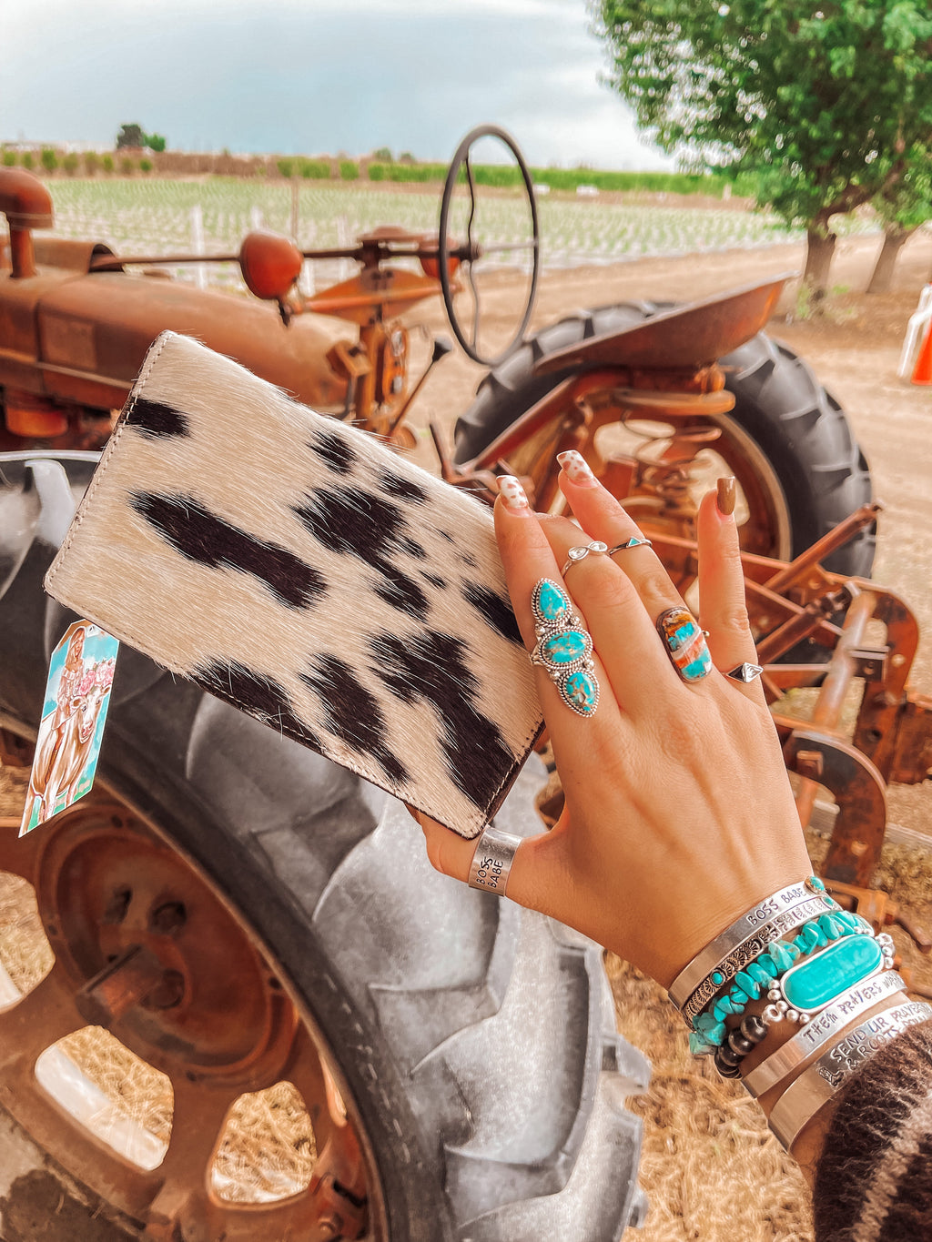Haute Southern Hyde Dusty Anna Tooled Wallet — Haute Southern Hyde branding close-up