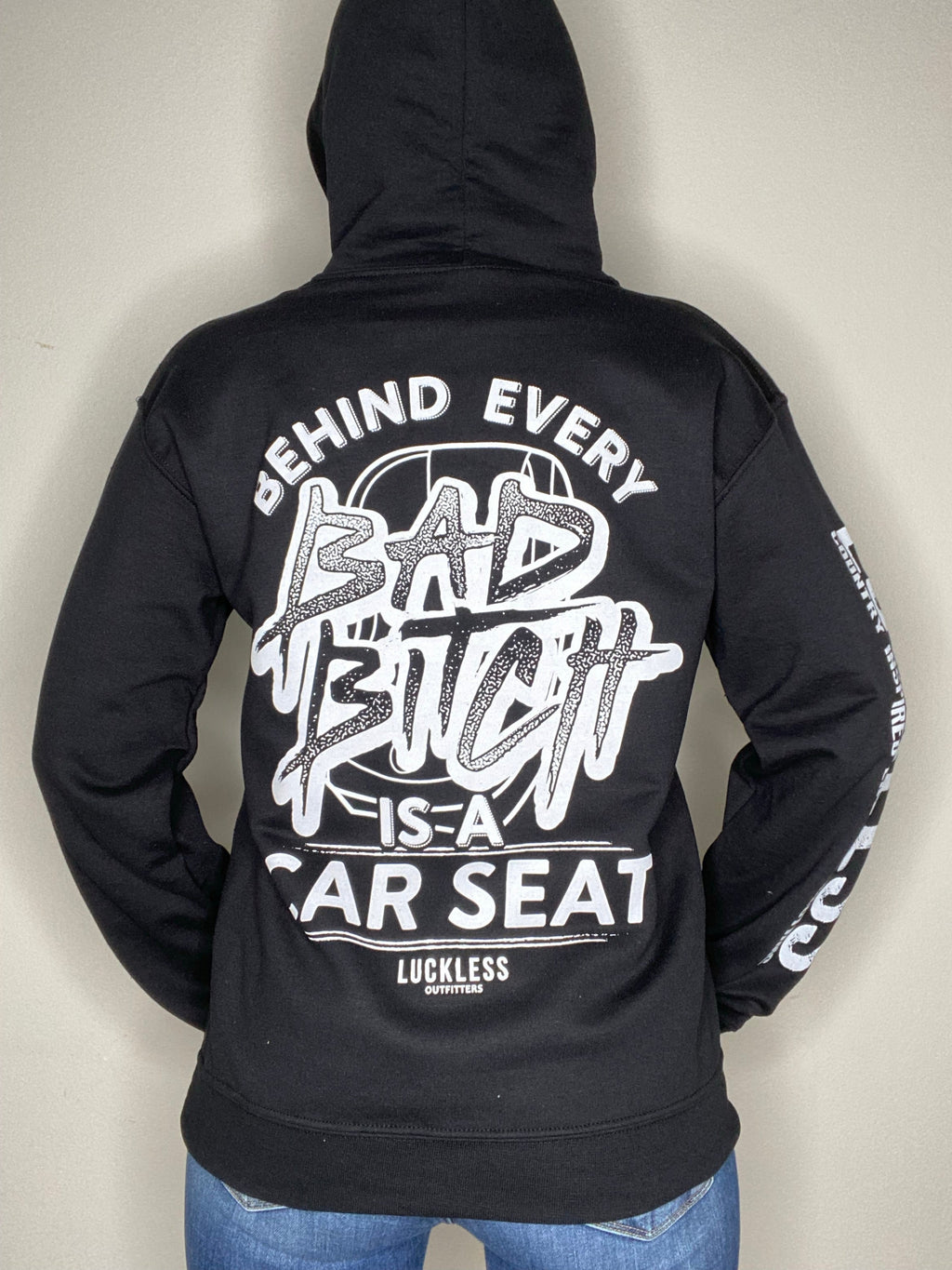 Luckless Outfitters Behind Every Bad B*tch Is A Car Seat Hoodie — detail close-up