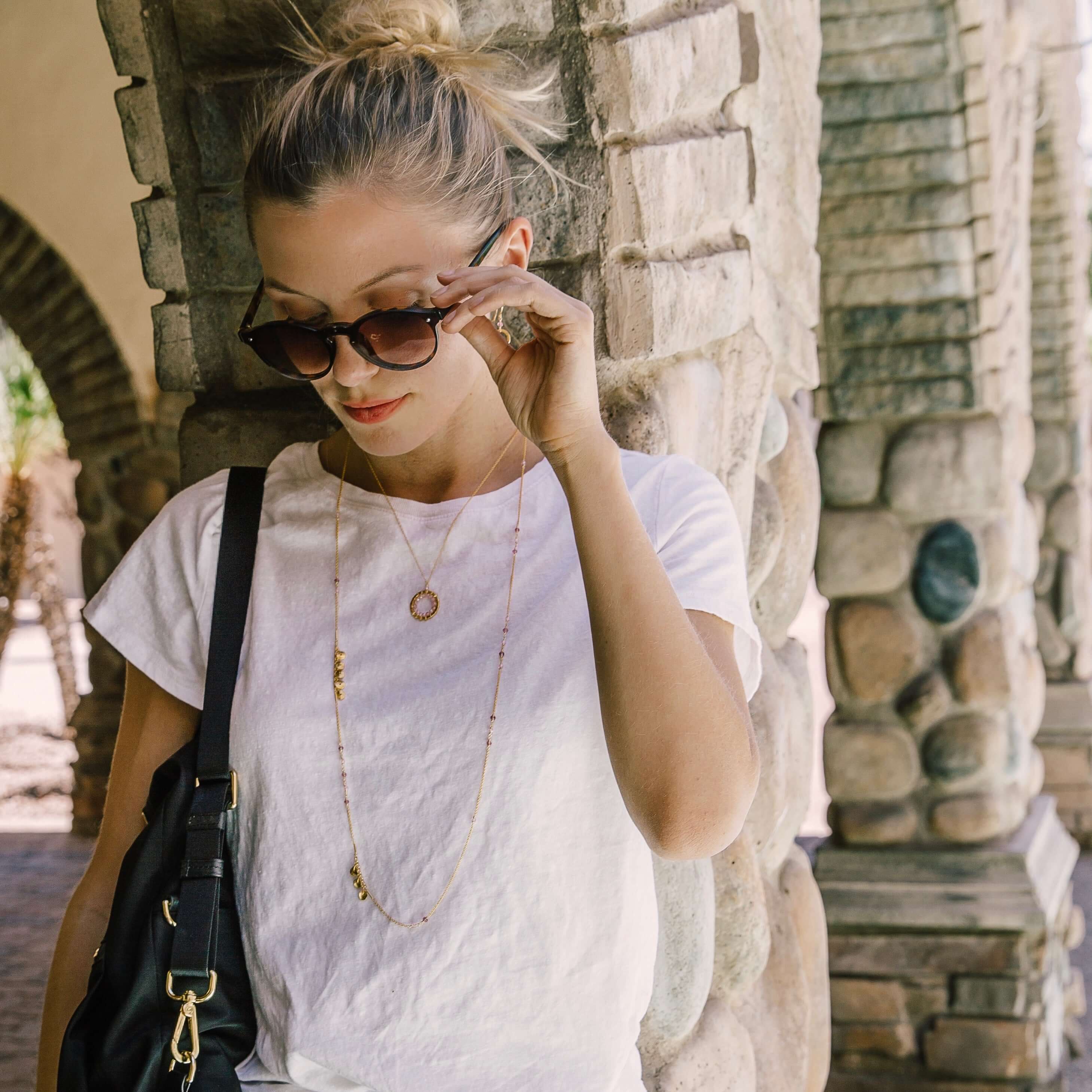 PARKEN JEWELRY Halo Mini Gold Pendants — lifestyle worn / used context