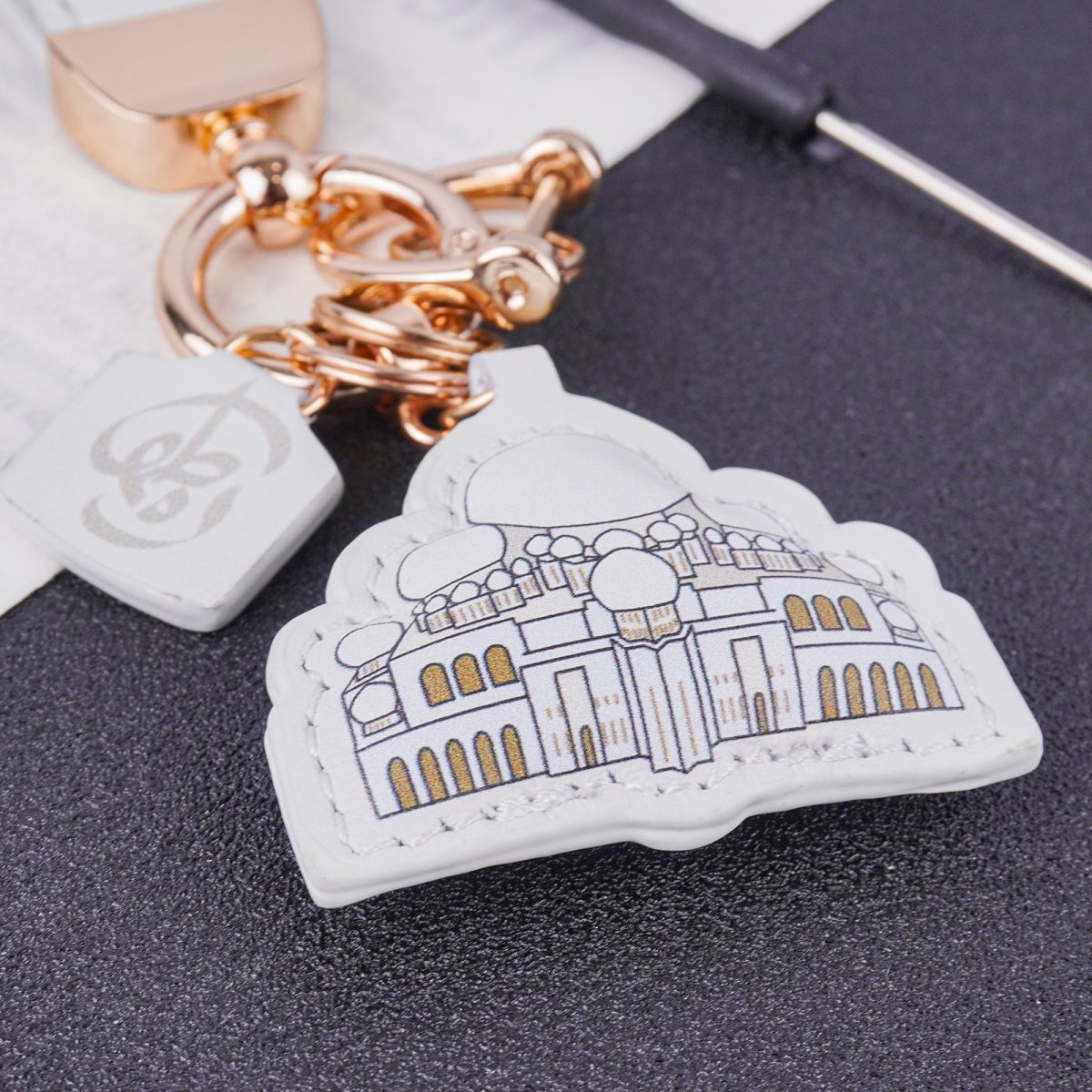 Mariam's Collection Islamic Leather Keychain with Arabic Calligraphy & Mosque Pendant Sheepskin… — Mariam's Collection branding close-up