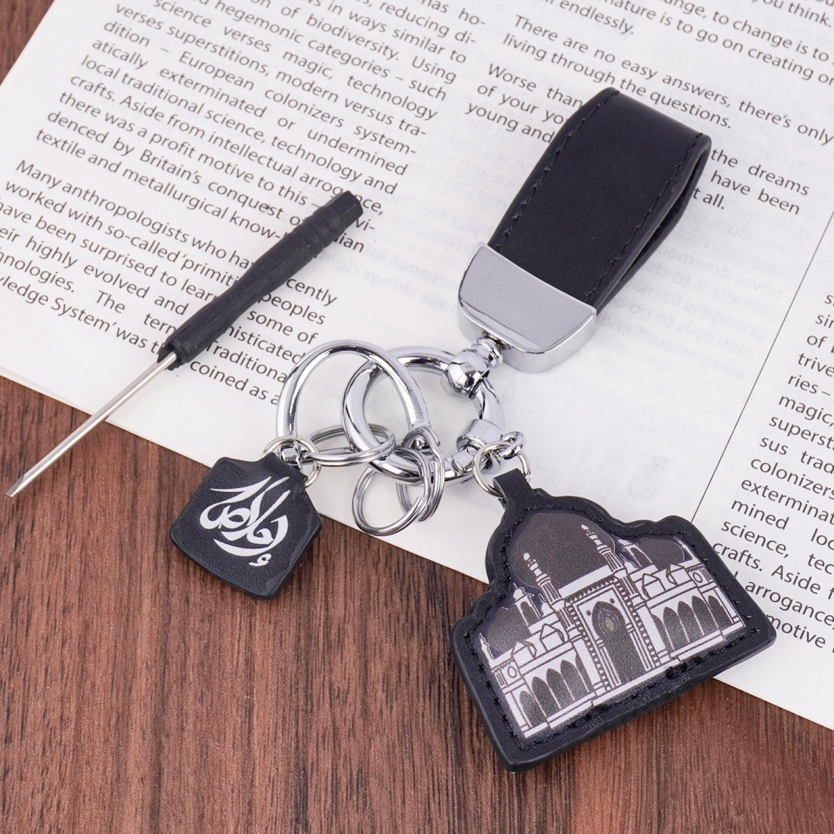 Mariam's Collection Islamic Leather Keychain with Arabic Calligraphy & Mosque Pendant Sheepskin… — flat-lay composition