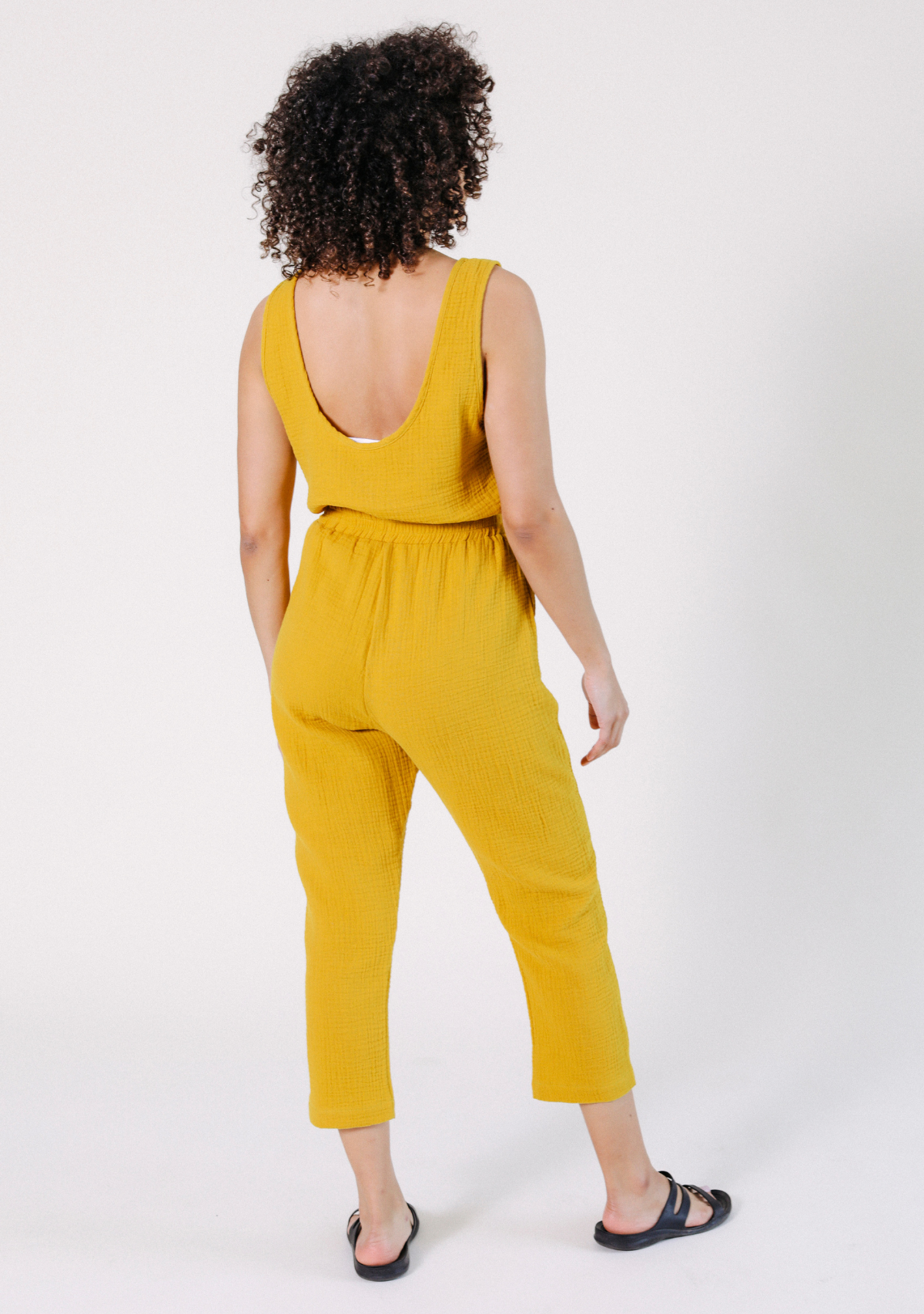WONENA POPLINEN Jameela Organic Cotton Jumpsuit - Golden — lifestyle worn / used context
