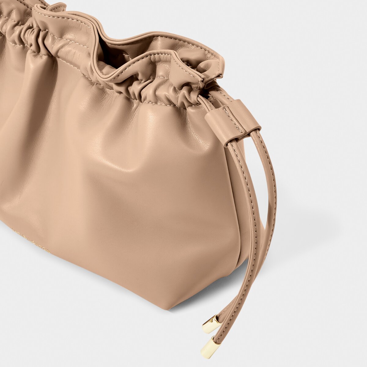 KADOU BOUTIQUE Hailey Crossbody Clutch - Soft Tan — lifestyle context
