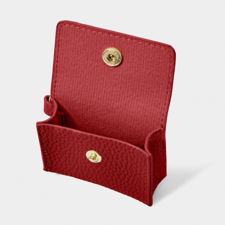 KADOU BOUTIQUE Evie Clip On AirPod Case — flat-lay composition