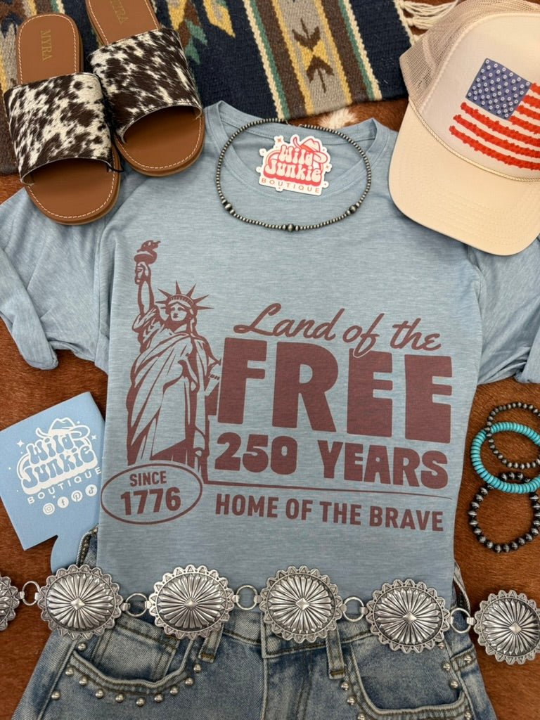 Wild Junkie Land of the Free 250 Years Graphic Tee — Wild Junkie branding close-up