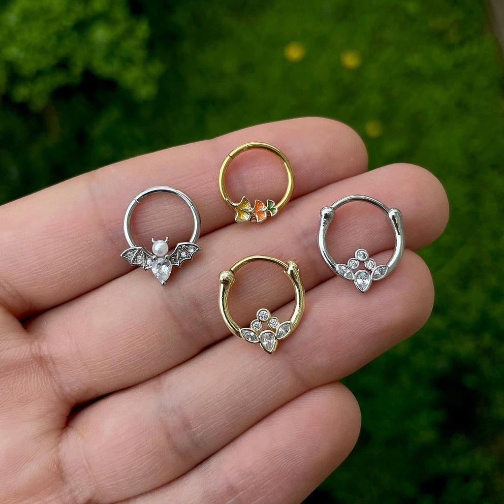 BodyCandy 16G 3/8 Autumn Leaves Fall Hinged Segment Ring — detail close-up