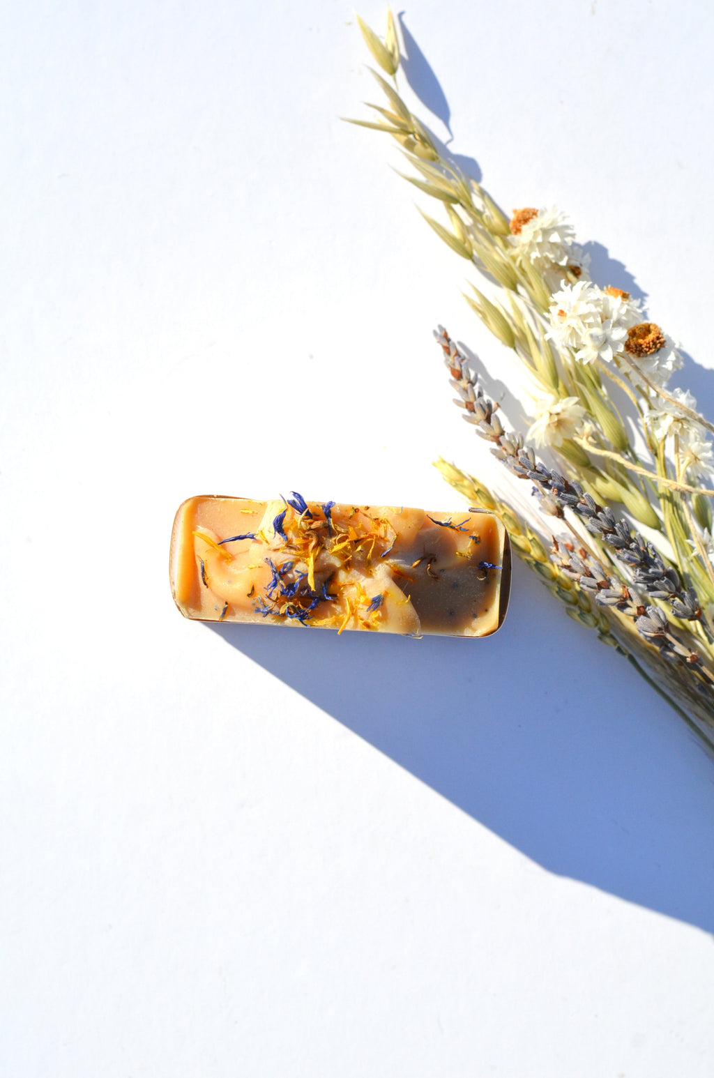 Pretty farm girl Lemon + Honey + Poppy Seed Handmade Tallow and Goat Milk Soap Bar — side view