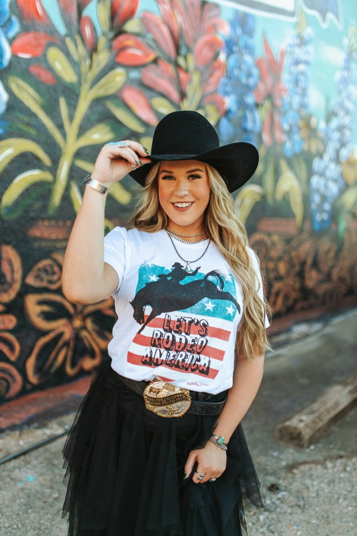 Wild Junkie Let's Rodeo America Graphic Tee — Wild Junkie branding close-up
