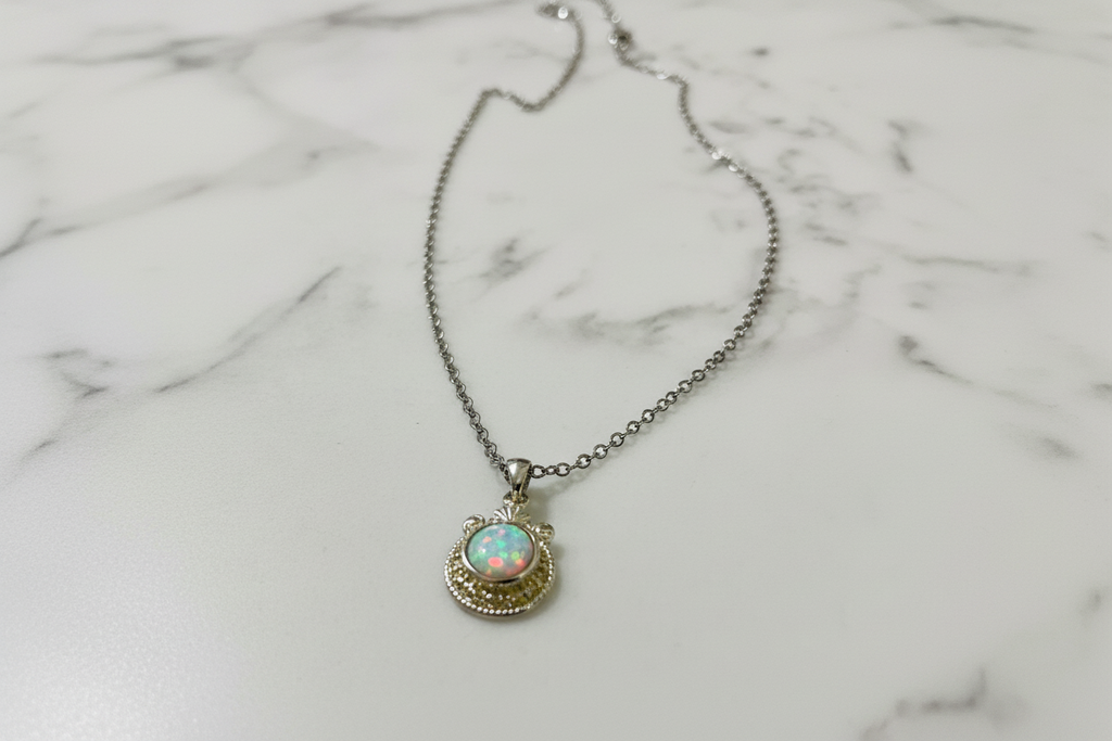 Just Neat Stuff Opal and silver — side view