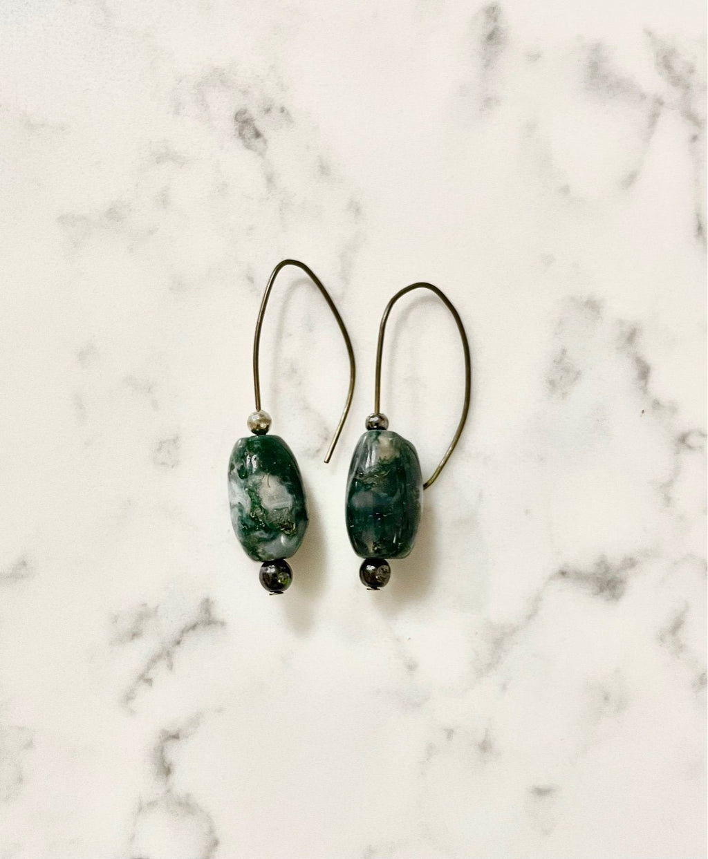 Just Neat Stuff Green Glass Earrings — detail close-up