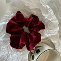 Mariam's Collection MAC009 hijab scrunchies, velvet flower hair accessories — Mariam's Collection branding close-up