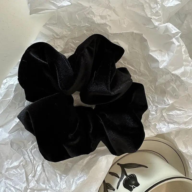 Mariam's Collection MAC009 hijab scrunchies, velvet flower hair accessories — lifestyle worn / used context