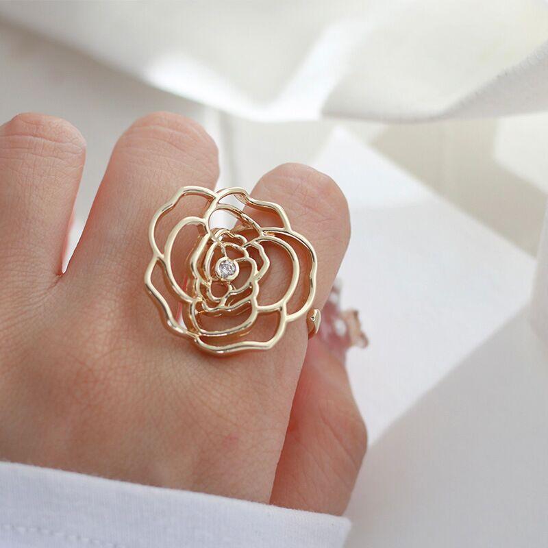 Mariam's Collection Mariam's Collection MAC046 Adjustable Hollow Camellia Diamond Ring — Mariam's Collection branding close-up