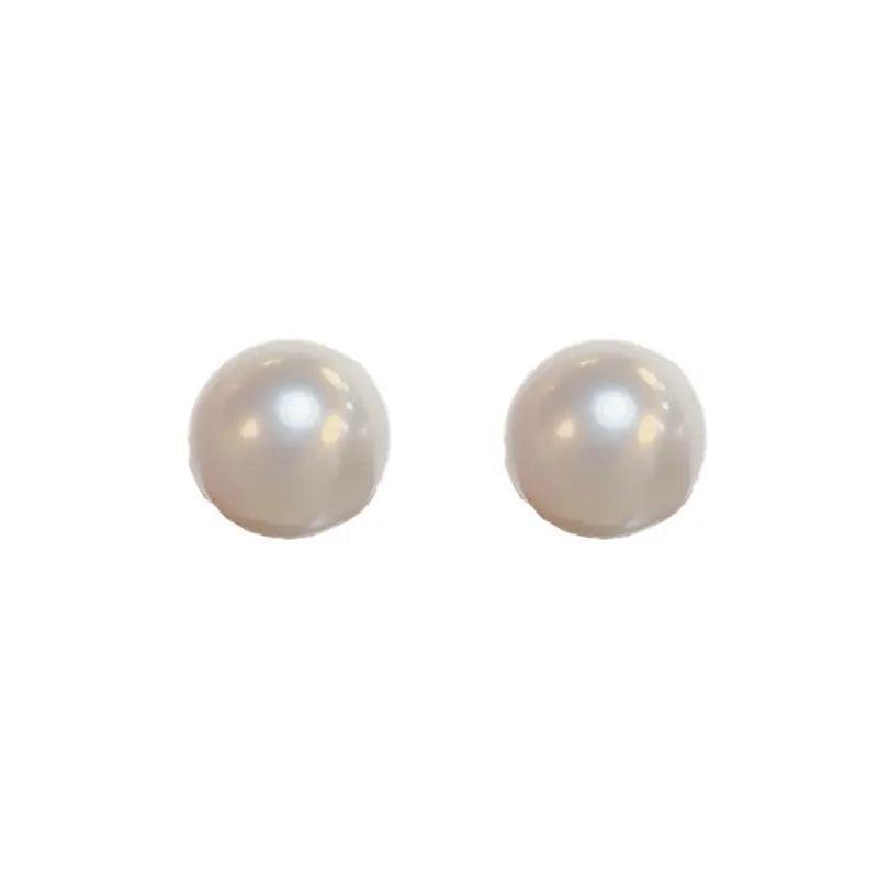 Mariam's Collection Mariam's Collection MAC055 Natural Freshwater Pearl Stud Earrings — lifestyle worn / used context