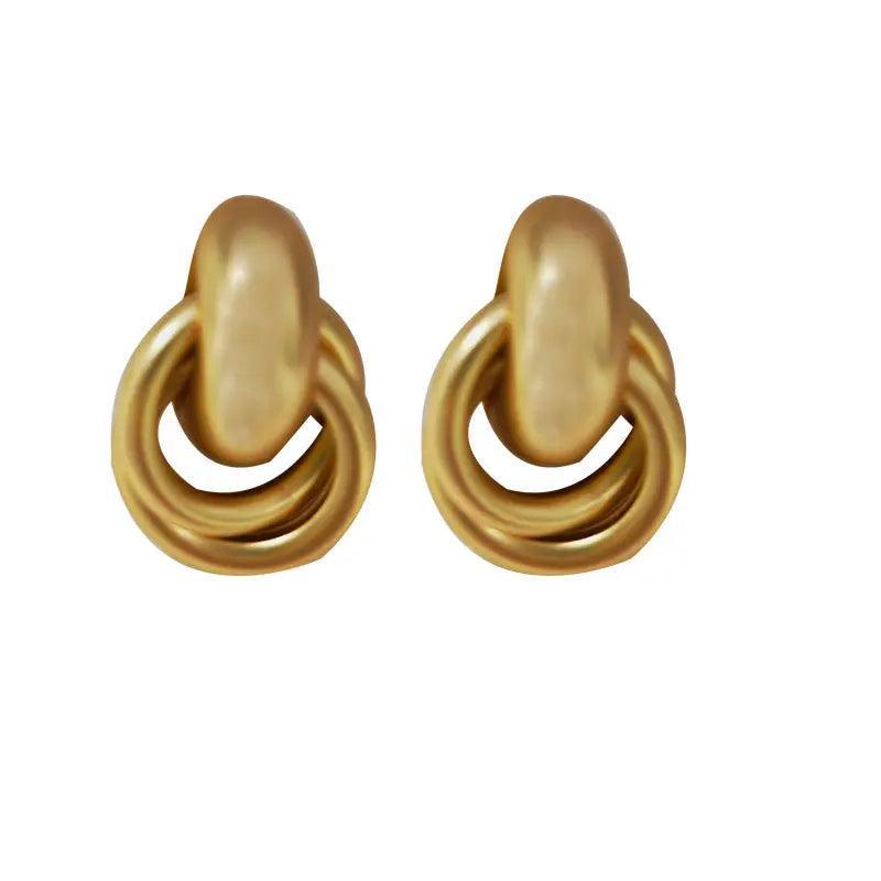 Mariam's Collection Mariam's Collection MAC064 Interlocking Circle Earrings — Mariam's Collection branding close-up