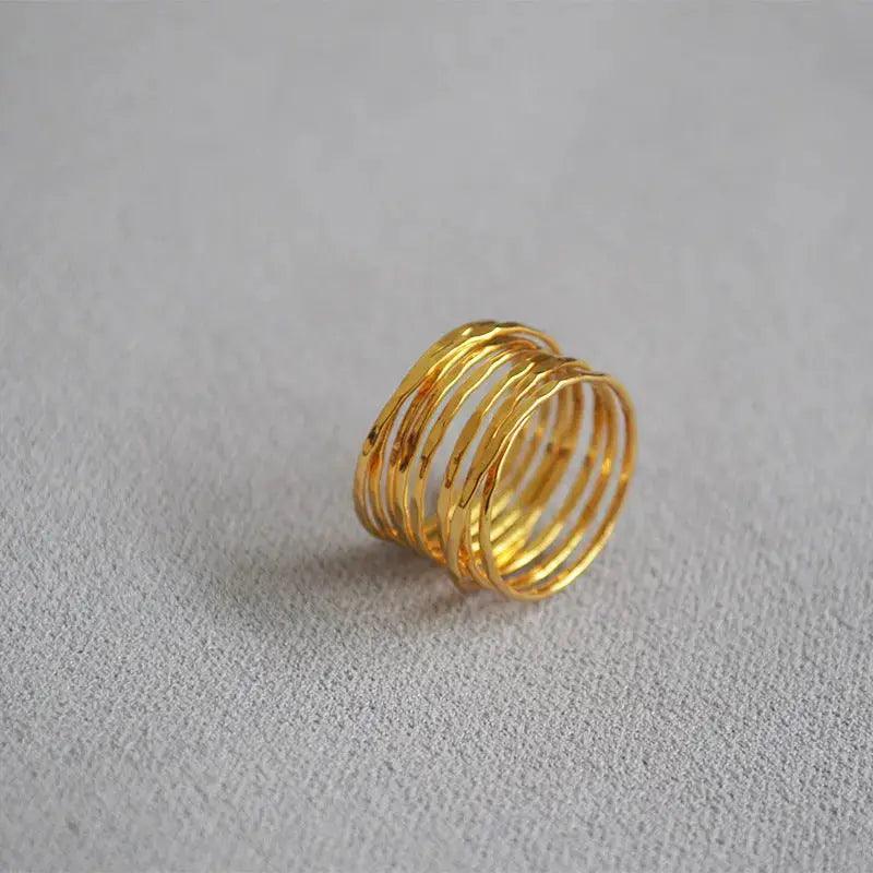 Mariam's Collection Mariam's Collection MAC067 Metallic Gold Zircon Ring 3-Piece Set — Mariam's Collection branding close-up