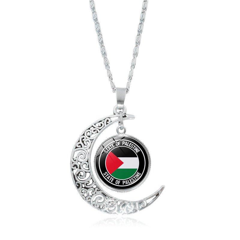 Mariam's Collection MAC077 Women's Versatile Silver keffiyeh Hollow Moon Pendant Necklace — Mariam's Collection branding close-up