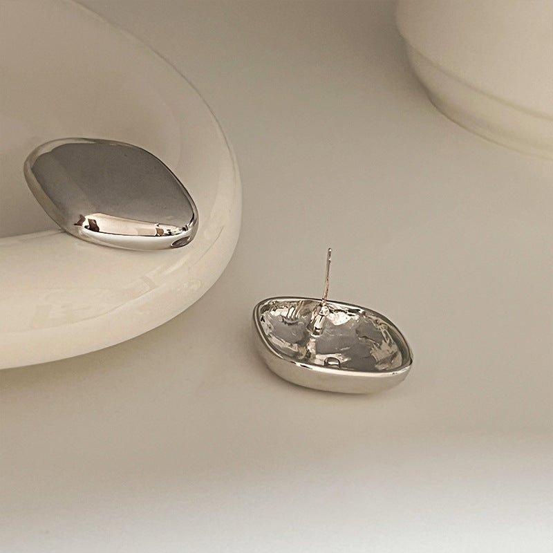 Mariam's Collection MAC096 925 sterling silver needle high-end French style earrings — Mariam's Collection branding close-up