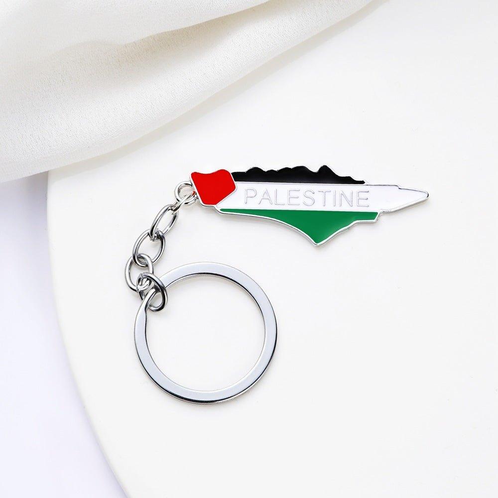 Mariam's Collection Mariam's Collection MAC106 Free Pakistan Keffiyeh Key Metal Pendant — Mariam's Collection branding close-up