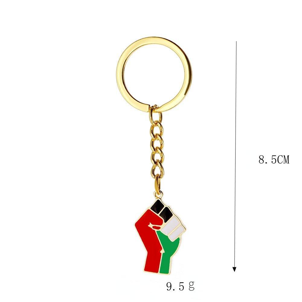 Mariam's Collection Mariam's Collection MAC106 Free Pakistan Keffiyeh Key Metal Pendant — lifestyle worn / used context