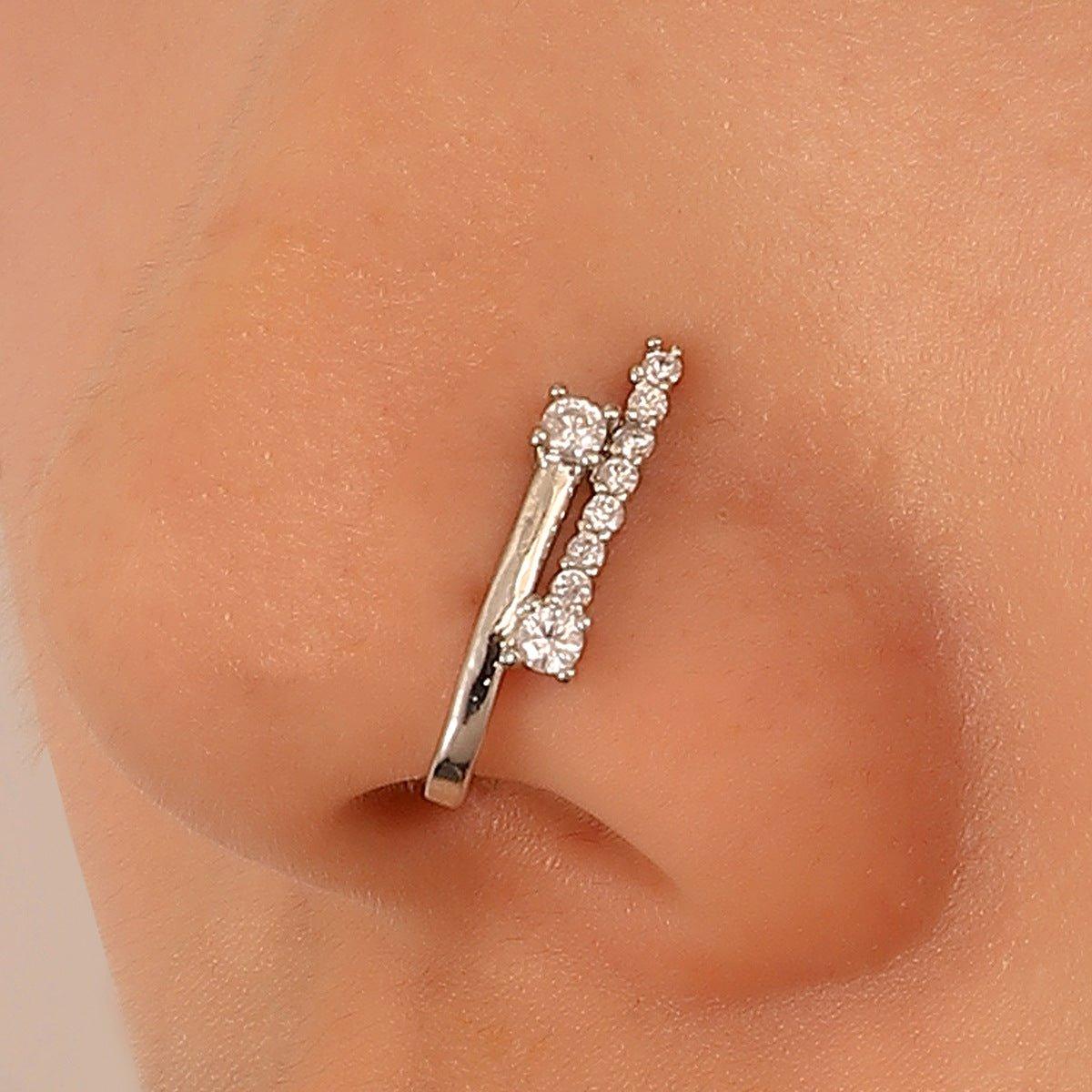 Mariam's Collection MAC134  Non-Puncture T-Shape Micropaved Zirconia Nose Ring — lifestyle worn / used context