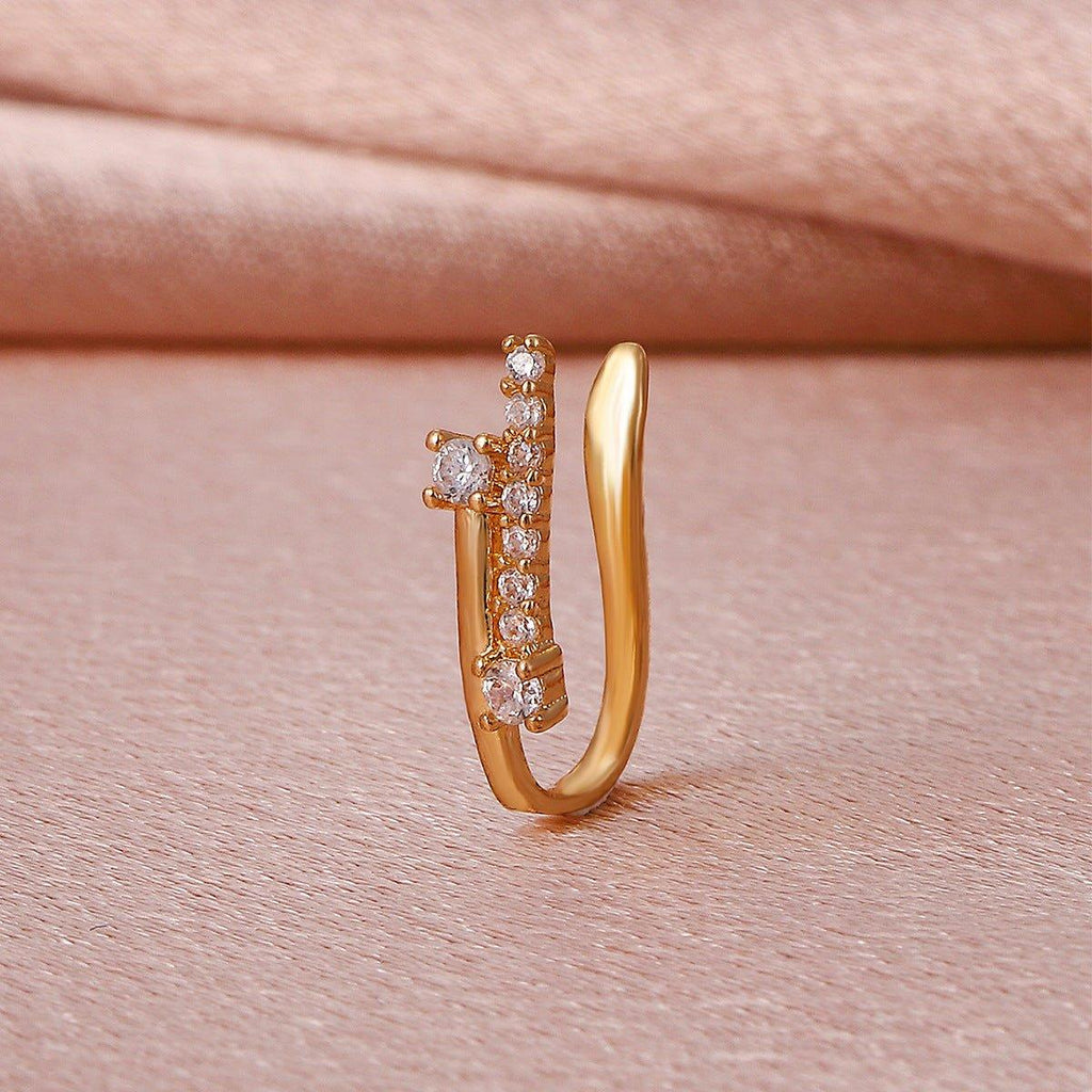 Mariam's Collection MAC134  Non-Puncture T-Shape Micropaved Zirconia Nose Ring — Mariam's Collection branding close-up