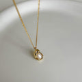 Mariam's Collection Mariam's Collection MAC136 High-end Pendant Pearl Necklace — Mariam's Collection branding close-up