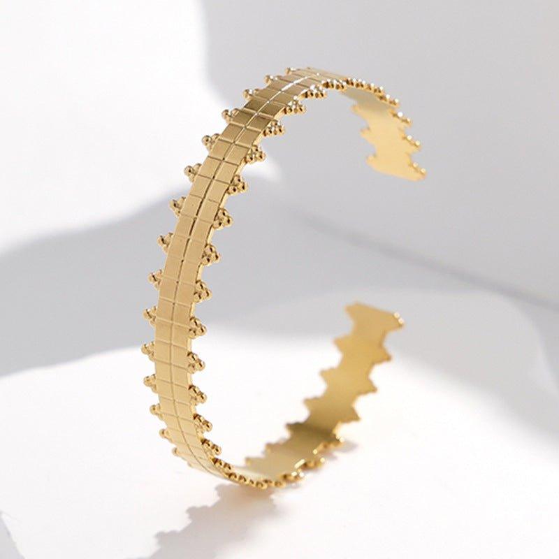 Mariam's Collection MAC143 Titanium Steel Colorfast Adjustable Bracelet — Mariam's Collection branding close-up