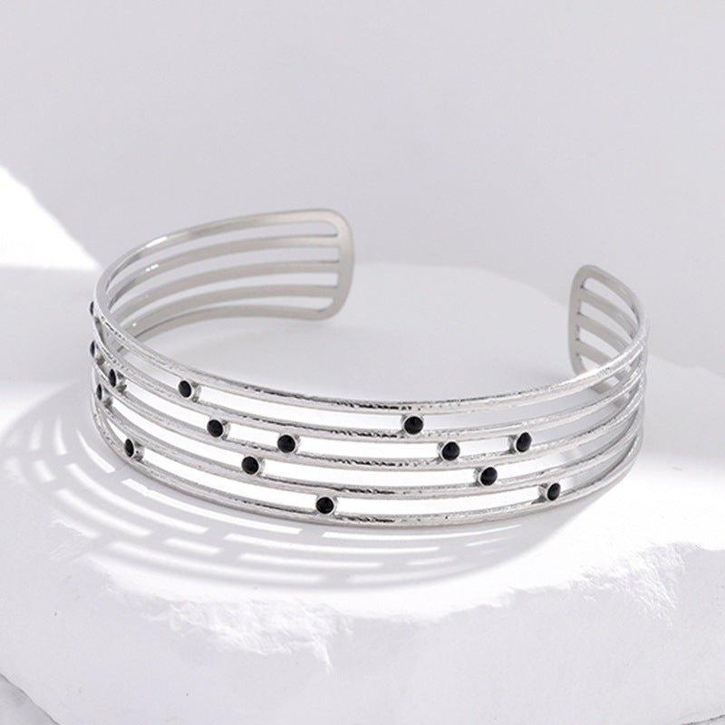Mariam's Collection MAC143 Titanium Steel Colorfast Adjustable Bracelet — flat-lay composition