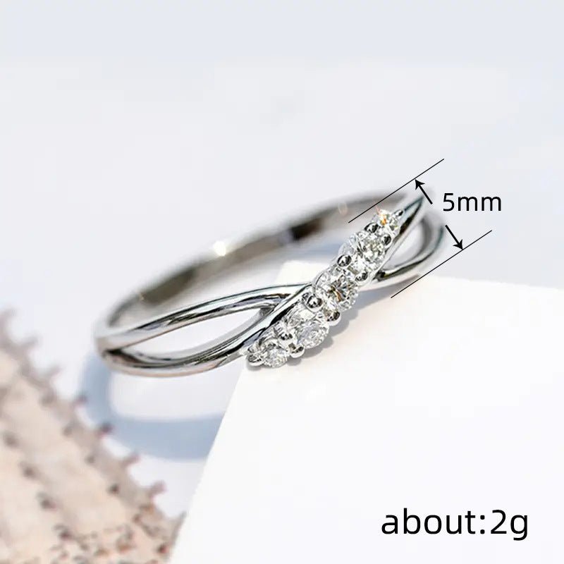 Mariam's Collection Mariam's Collection MAC162 Simple Micropaved Cross Hollow Ring — Mariam's Collection branding close-up